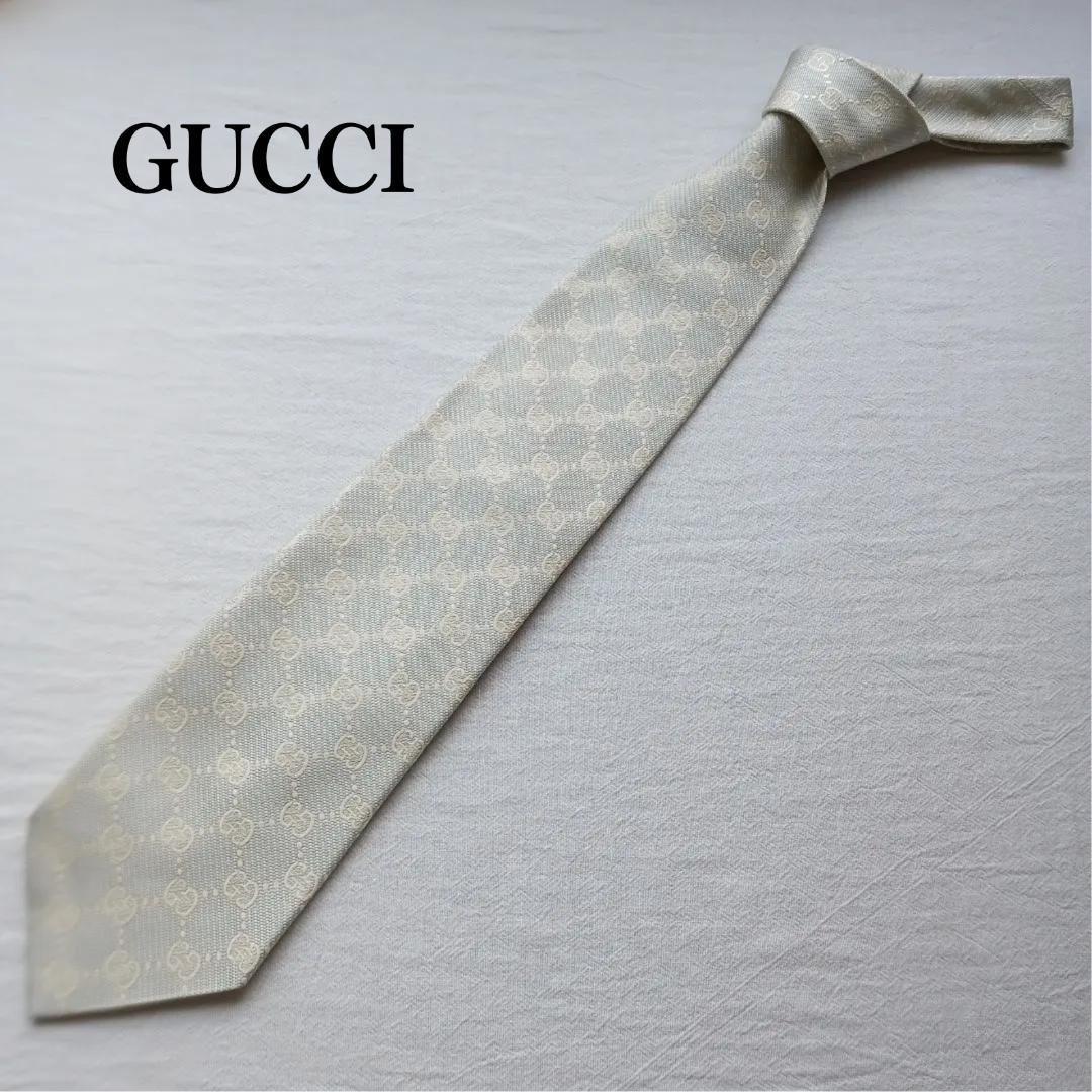 【美品】グッチ ネクタイ 白銀 GUCCIの小紋柄 絹 光沢 結婚式【n3731